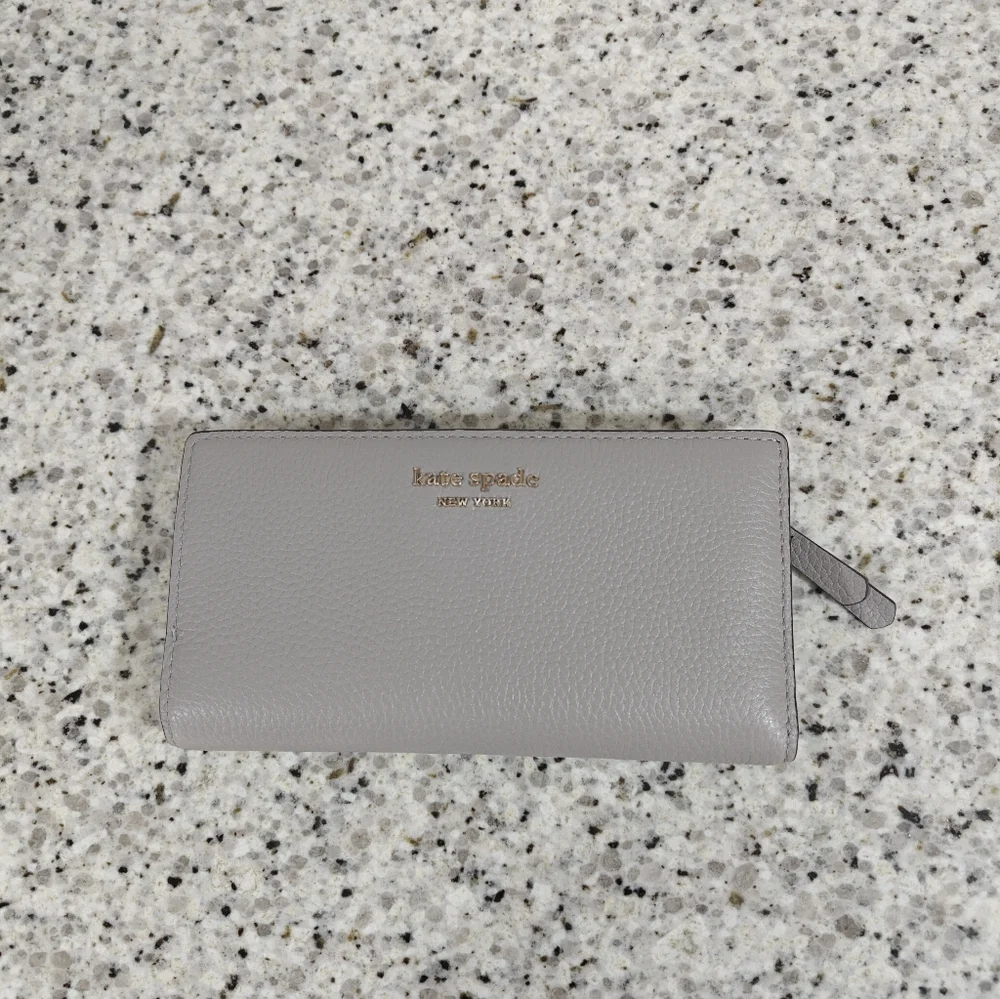 Kate spade roulette wallet (gray)